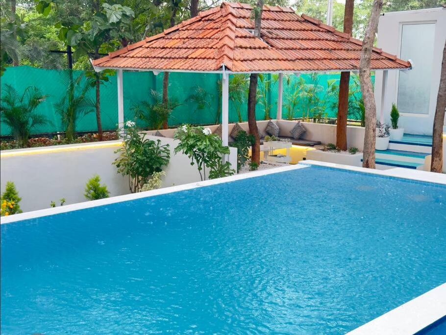 Serenity Farm Stay Hampapura ภายนอก รูปภาพ